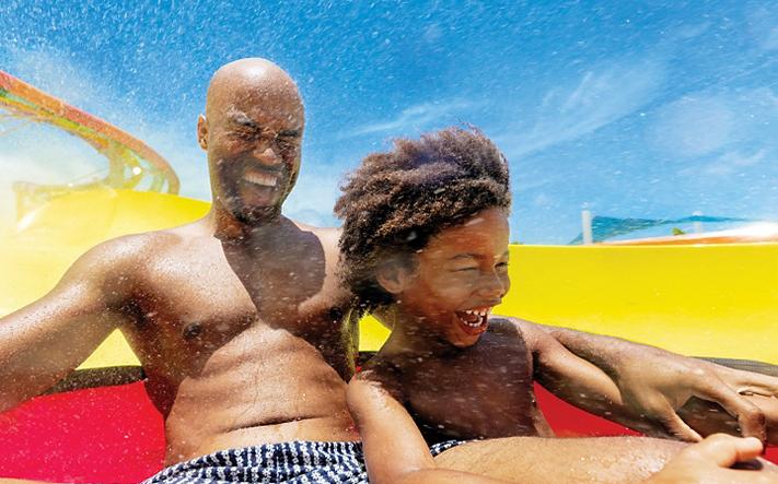 perfect-day-coco-cay-thrill-water-park-slingshot-father-son-laughing